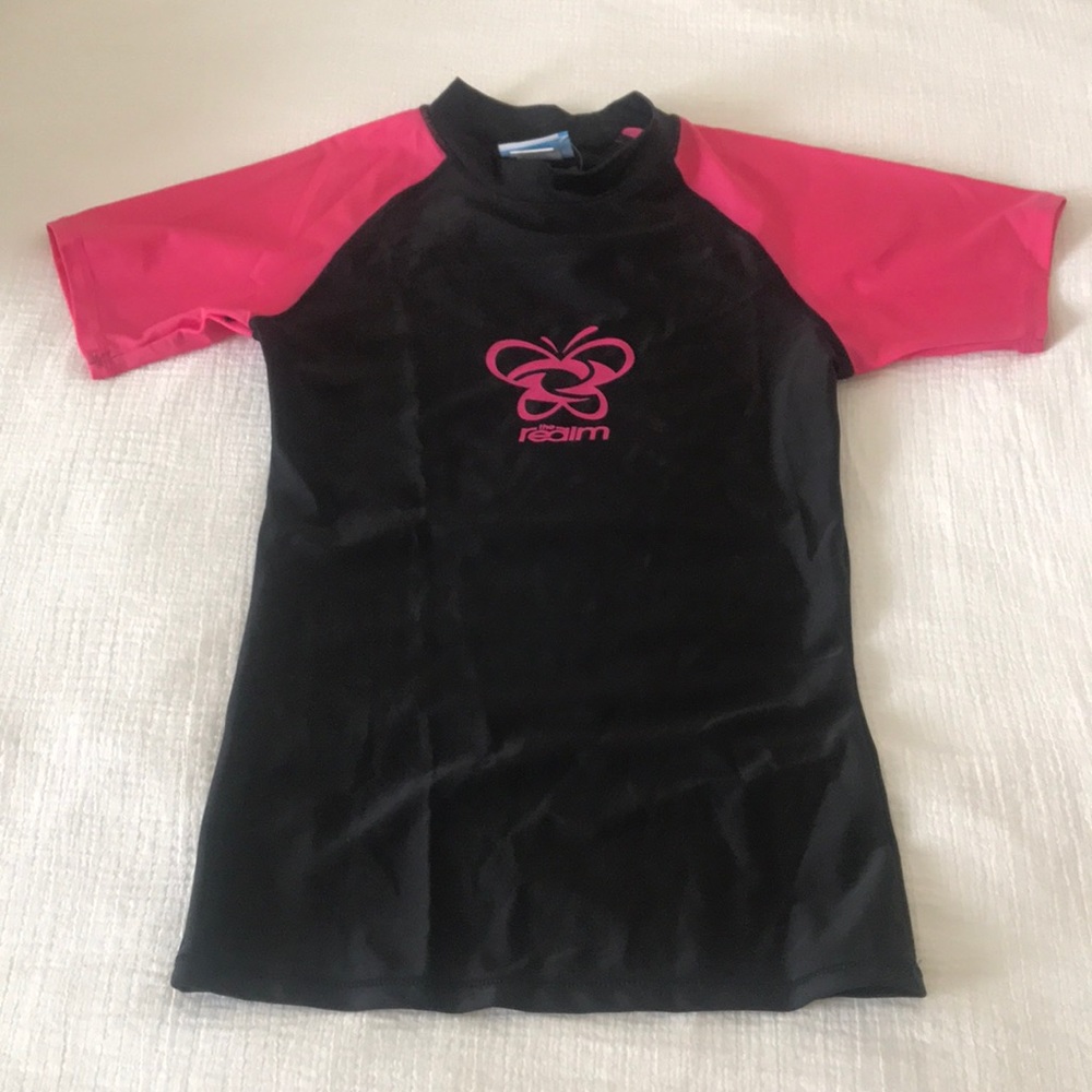 Pink & black short-sleeved swim tee. Never worn.